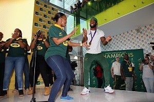 Springboks captain, Siya Kolisi, in joyous mood with an MTN staffer at the Trophy Tour at MTN Headquarters in Fairland on Thursday.