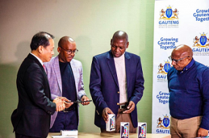 South Africa health minister, Dr Zweli Mkihize (2nd from right), receives equipment donated by Samsung and Telkom for the fight against COVID-19.