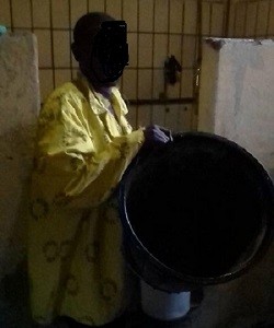 Thohoyandou Prison inmate showing CAJ News Africa the dustbin in which  they are being served drinking water from. Photo, supplied