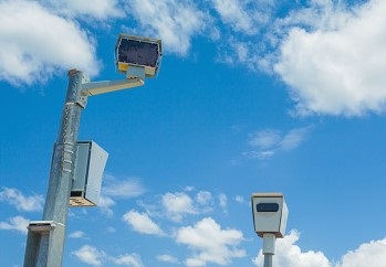 Speed camera system monitoring vehicle speeds on Australian highway. This is all part of road safety and law enforcement.