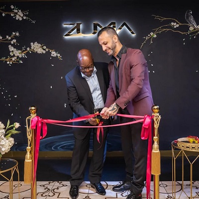 Zuma restaurant owner, David Manal and former South African President Jacob Zuma are seen cutting the ribbon during the opening of Zuma restaurant. Photo supplied by the owner