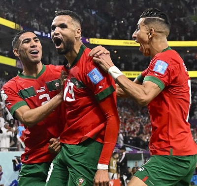 Morocco forward Youssef En-Nesyri celebrates his goal with teammates. Photo by Patricia De Melo Moreira, AFP