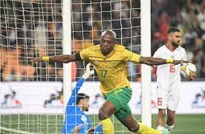 Zakhele Lepasa celebrates after scoring Bafana's second goal against Morocco.