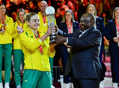 South African president Cyril Ramaphosa (left) presents trophy to Australia, Netball World Cup champions