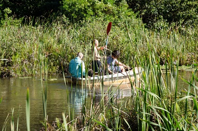 A small rowing boat Secret Sithela carries passengers at the Munster Estate along the South Coast, KwaZulu Natal