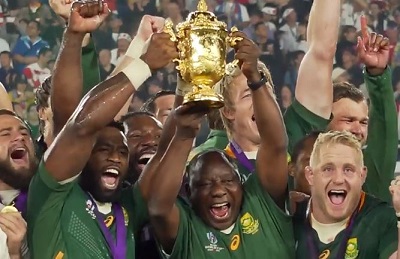 South African President Cyril Ramaphosa lifts the Rugby World Cup together with the Springboks captain Siya Kolisi