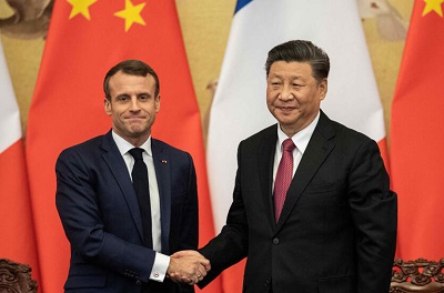 Chinese President Xi Jinping (right) with his French counterpart Emmanuel Macron